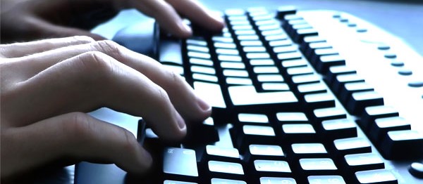 Hands typing on keyboard Hands typing on keyboard